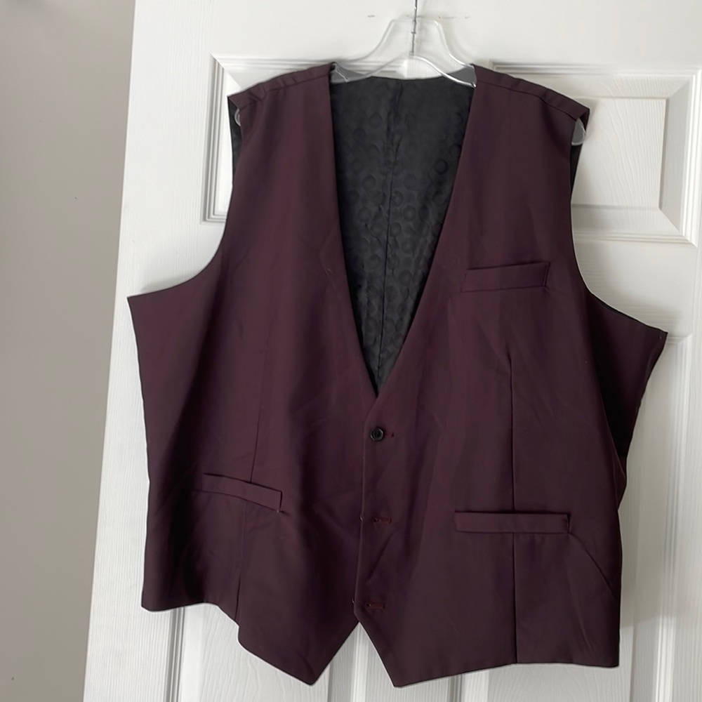 Woman’s purple vest